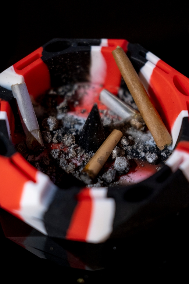 Cannabis joints and ash fill an ...