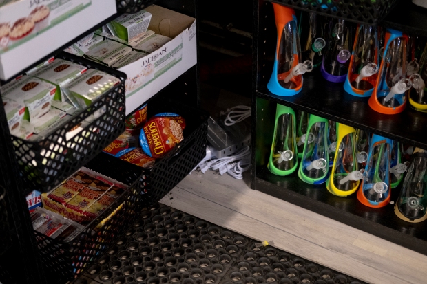 Snacks, or “munchies,” are seen behind ...