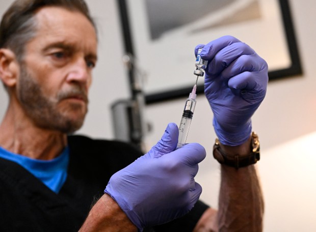 At Boulder Mind Care, Dr. Wade Grindle gives ketamine to some patients to help with their depression on November 14, 2022 in Boulder, Colorado. (Photo by RJ Sangosti/The Denver Post)