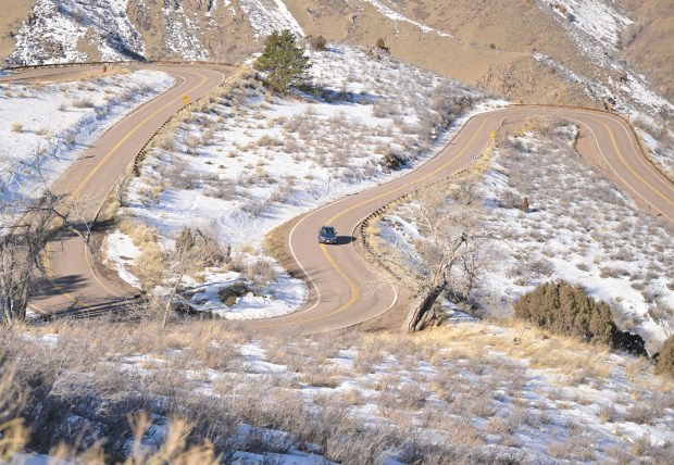 A driver heads up Lookout Mountain on Feb. 21, 2024. (Photo by RJ Sangosti/The Denver Post)